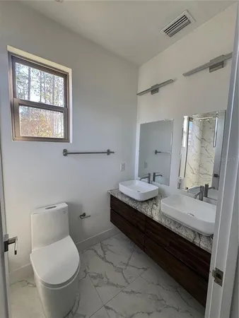 a bathroom with a shower and a tub