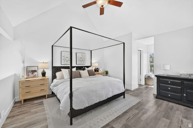 788 East Gables Street Midvale, UT 84047 - Photo 7 of 24 Room featuring vaulted ceilings with a wood-finish ceiling fan, and a large window