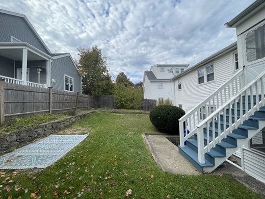 59 Desoto Road, Unit 2 Boston, MA 02132 - Photo 11 of 13 a view of a house with a yard