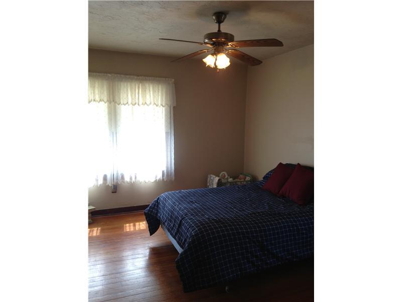 1214 Ridgeway Avenue Aliquippa, PA 15001 - Photo 12 of 17 Bedroom. Spacious bedrooms, original hardwood and new paint!