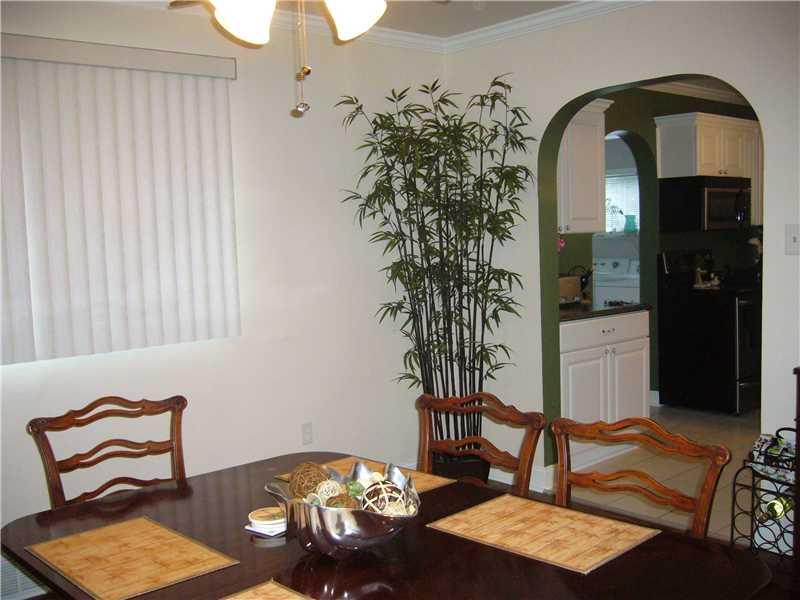 1214 Ridgeway Avenue Aliquippa, PA 15001 - Photo 7 of 17 Dining Room. another view of the dining room, leading into the kitchen and a sneak peak of the laundry room!