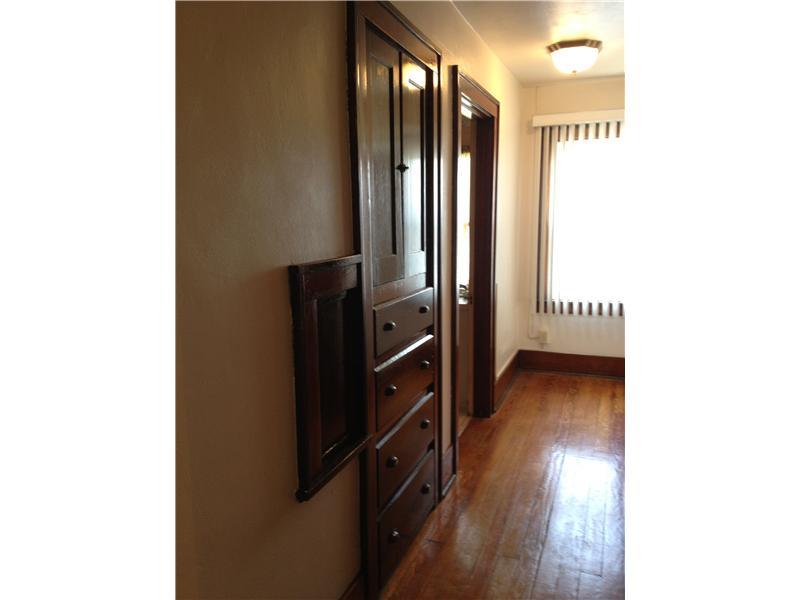 1214 Ridgeway Avenue Aliquippa, PA 15001 - Photo 10 of 17 Other. Upstairs hallway with beautiful built-ins and a laundry shoot!