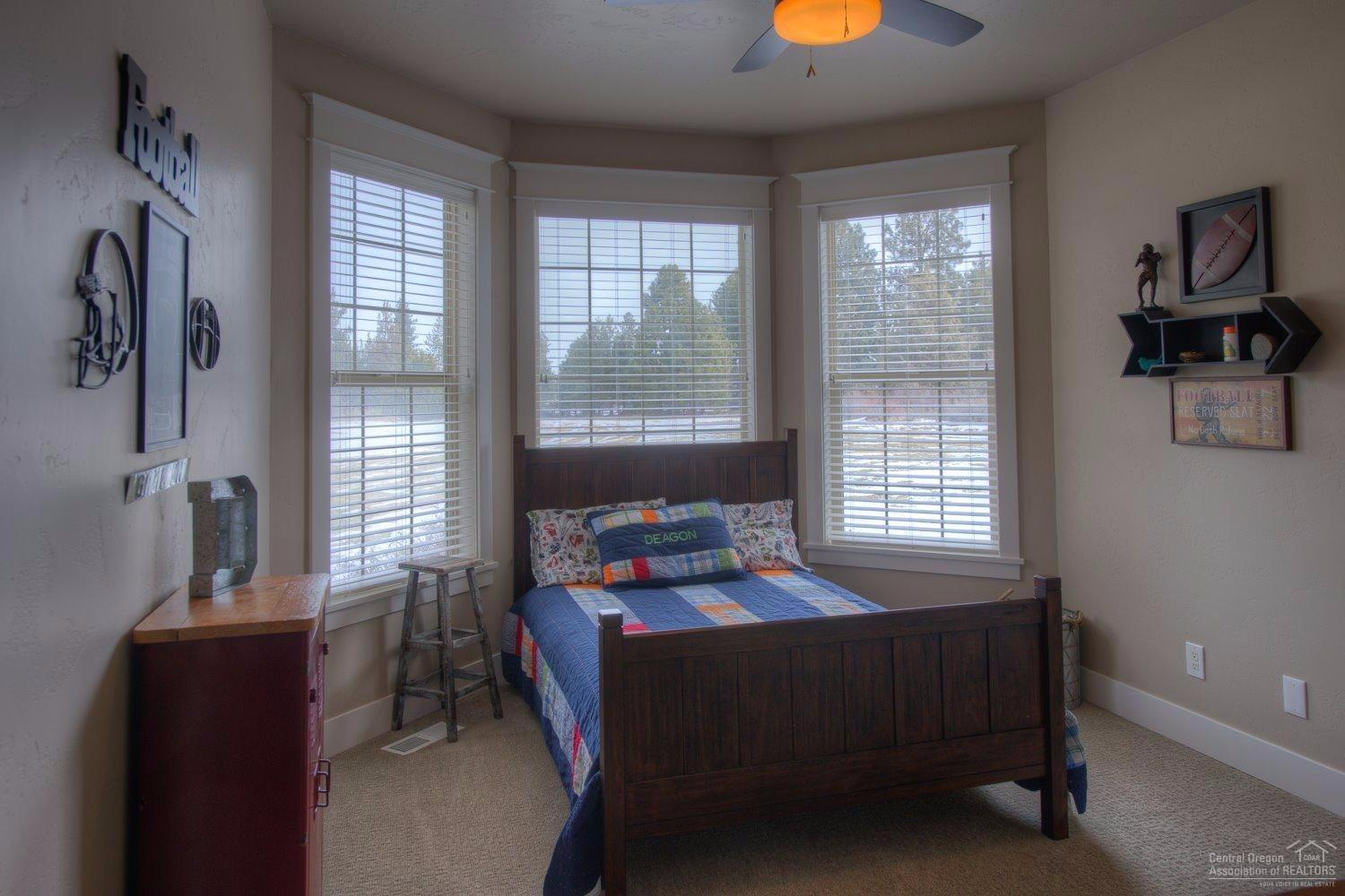 60570 Woodside Road Bend, OR 97702 - Photo 18 of 23 Bedroom #4, with a walk-in closet and fu