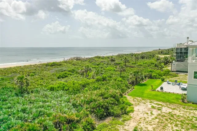 a view of swimming pool with a yard