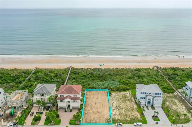 a view of an outdoor space with lounge chair
