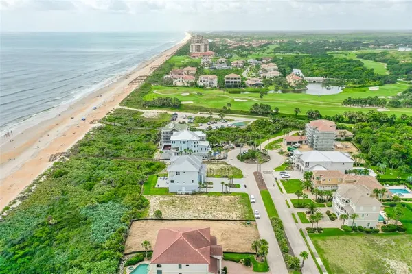 a view of city with ocean