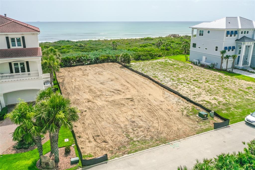 29 Ocean Ridge Boulevard Palm Coast, FL 32137 - Photo 5 of 51 a view of a backyard with potted plants