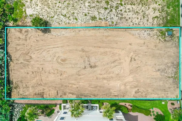 a view of a lake with a yard