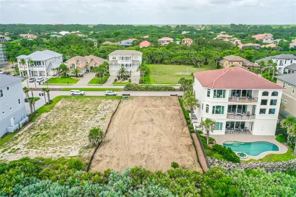 a view of a swimming pool with a garden