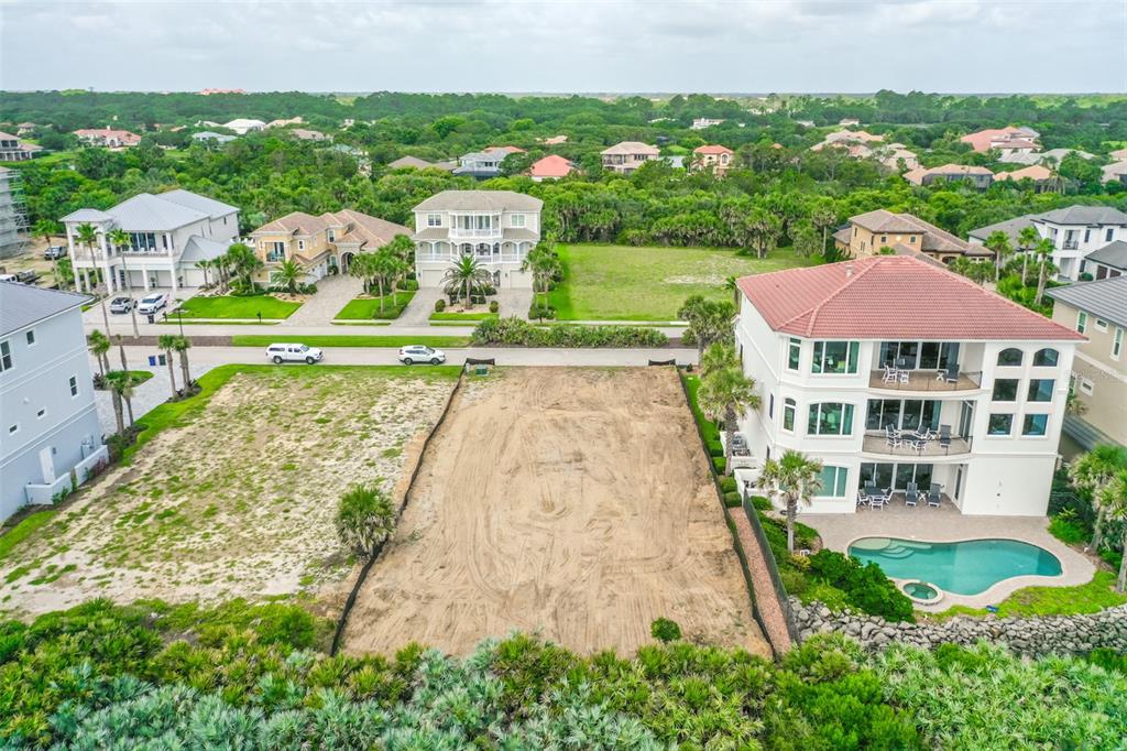 29 Ocean Ridge Boulevard Palm Coast, FL 32137 - Photo 9 of 51 a view of a swimming pool with a garden
