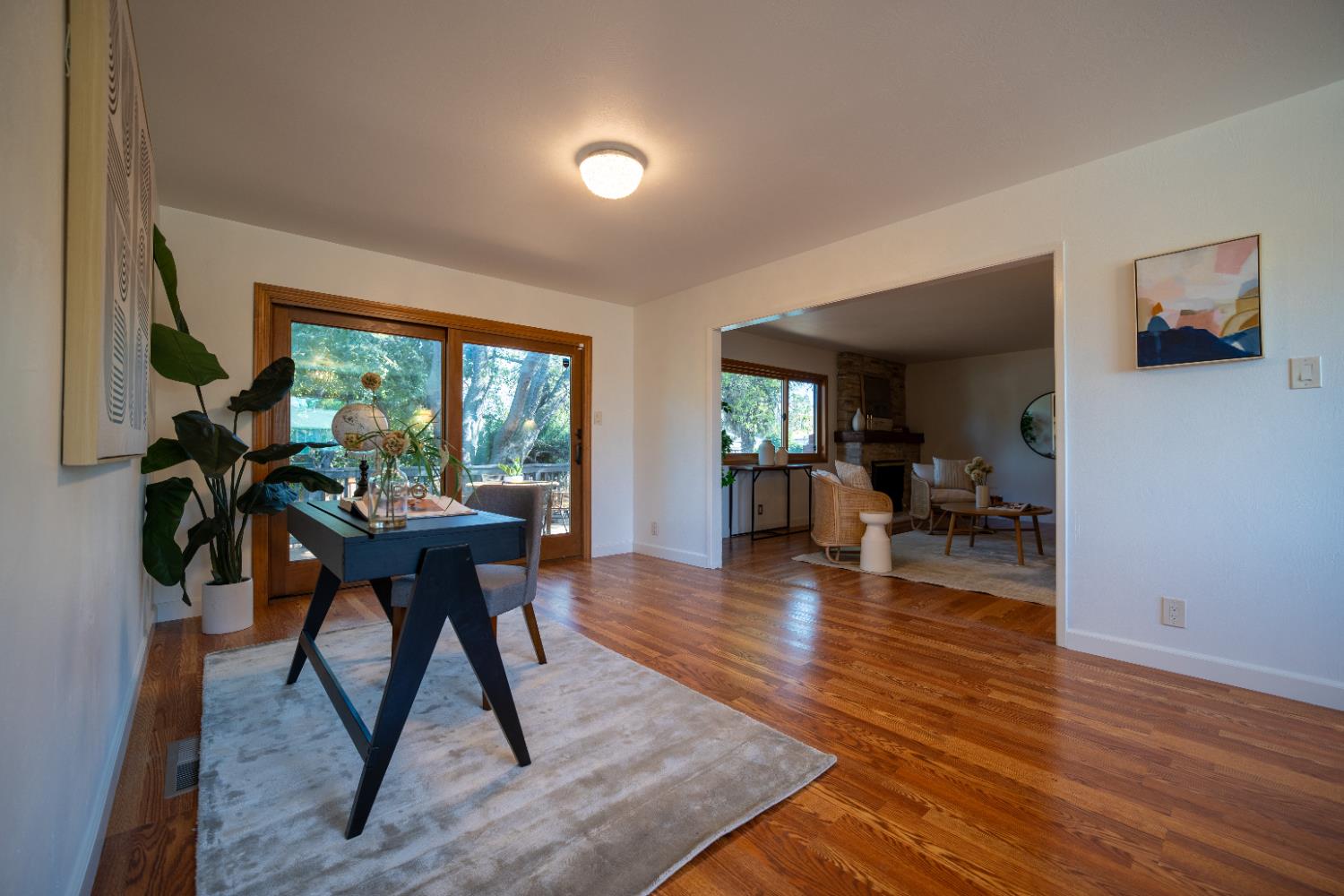 4220 Elva Way Sacramento, CA 95821 - Photo 13 of 52 a workspace with furniture window and wooden floor