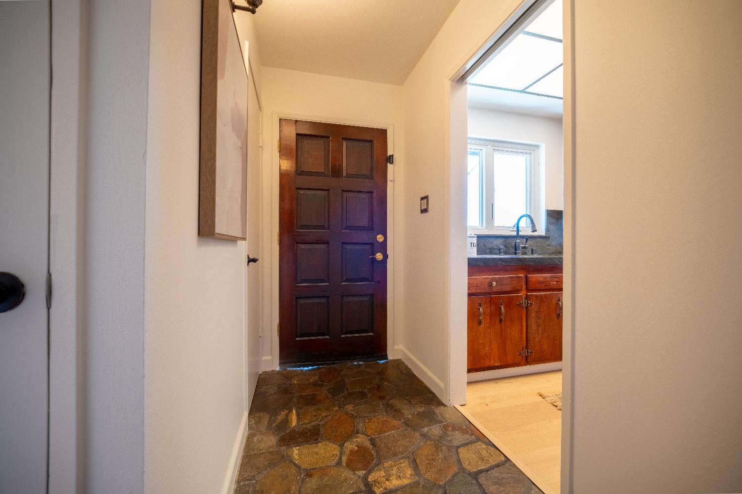 4220 Elva Way Sacramento, CA 95821 - Photo 17 of 52 a view of hallway with a door and a bathroom