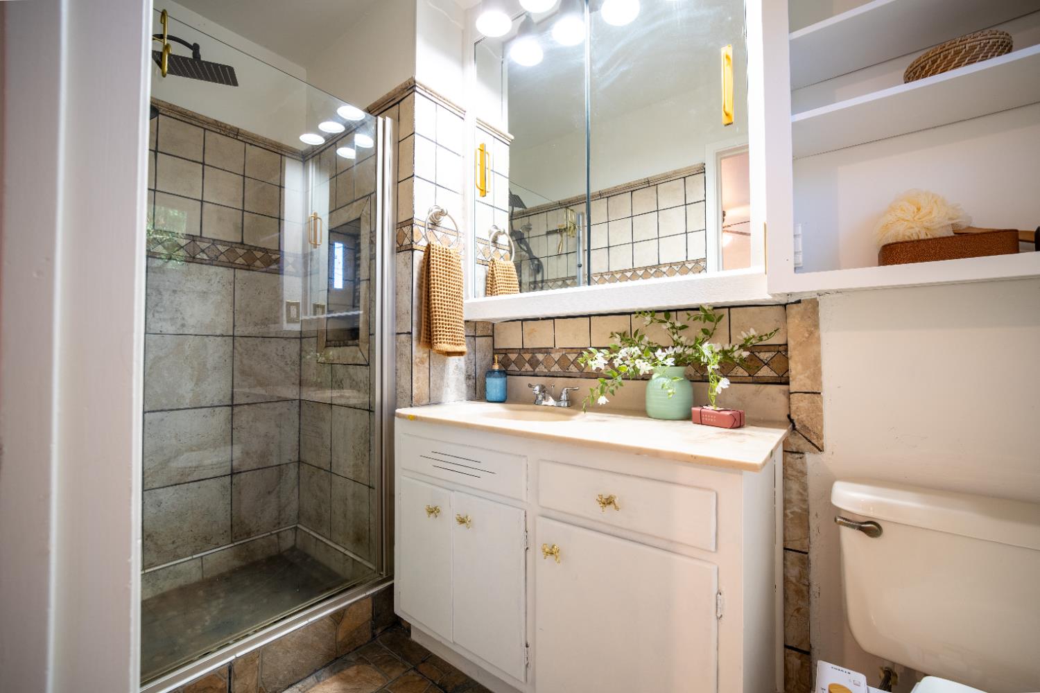 4220 Elva Way Sacramento, CA 95821 - Photo 32 of 52 a bathroom with a sink and a mirror