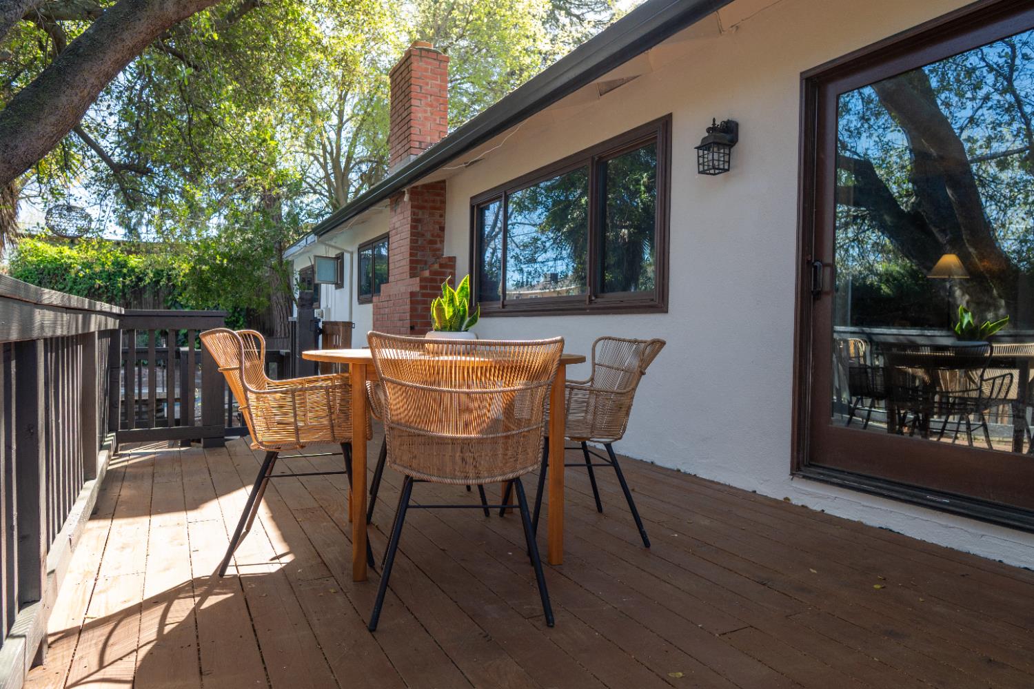 4220 Elva Way Sacramento, CA 95821 - Photo 36 of 52 a patio with table and chairs and potted plants