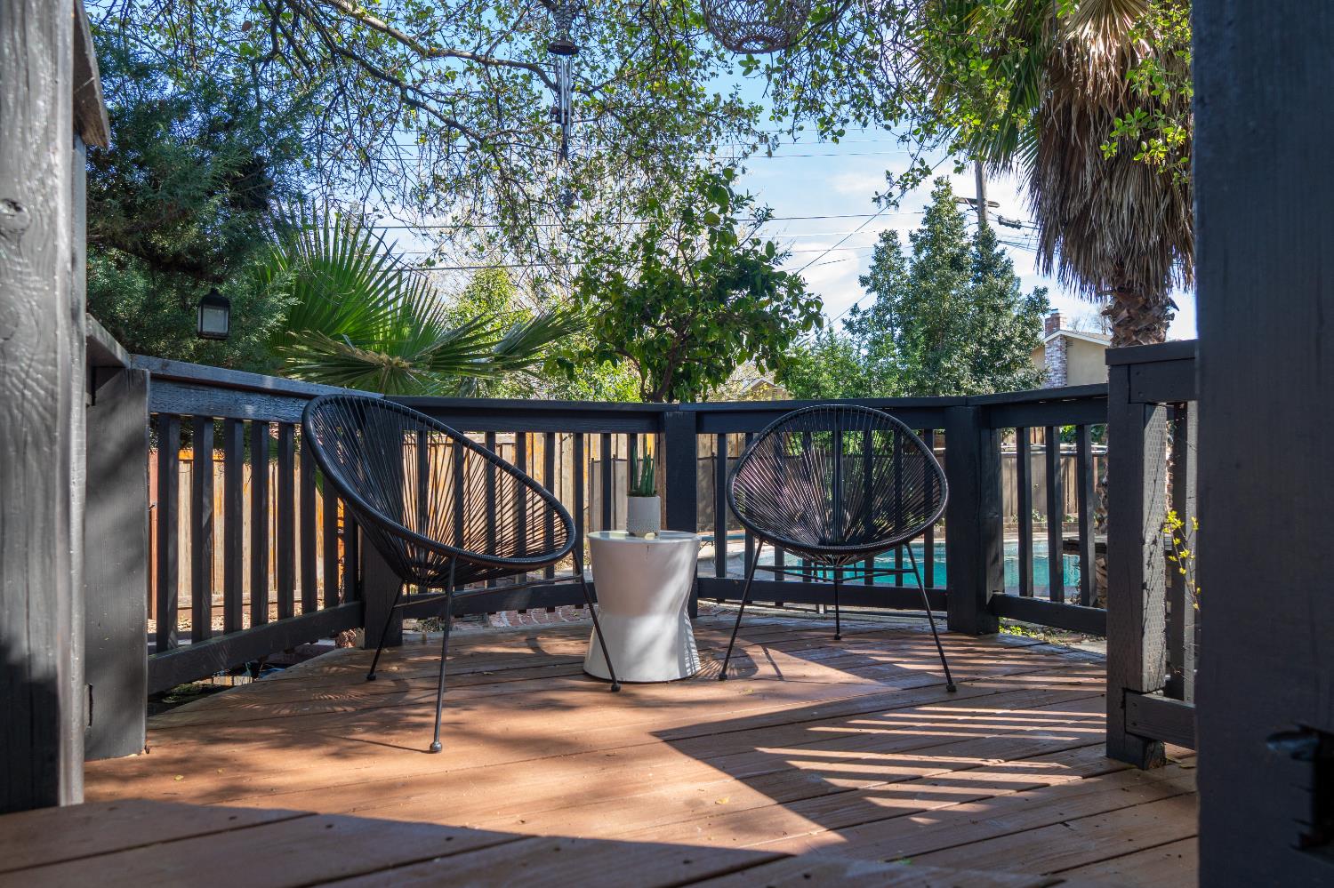 4220 Elva Way Sacramento, CA 95821 - Photo 37 of 52 a view of a balcony with chairs and wooden floor