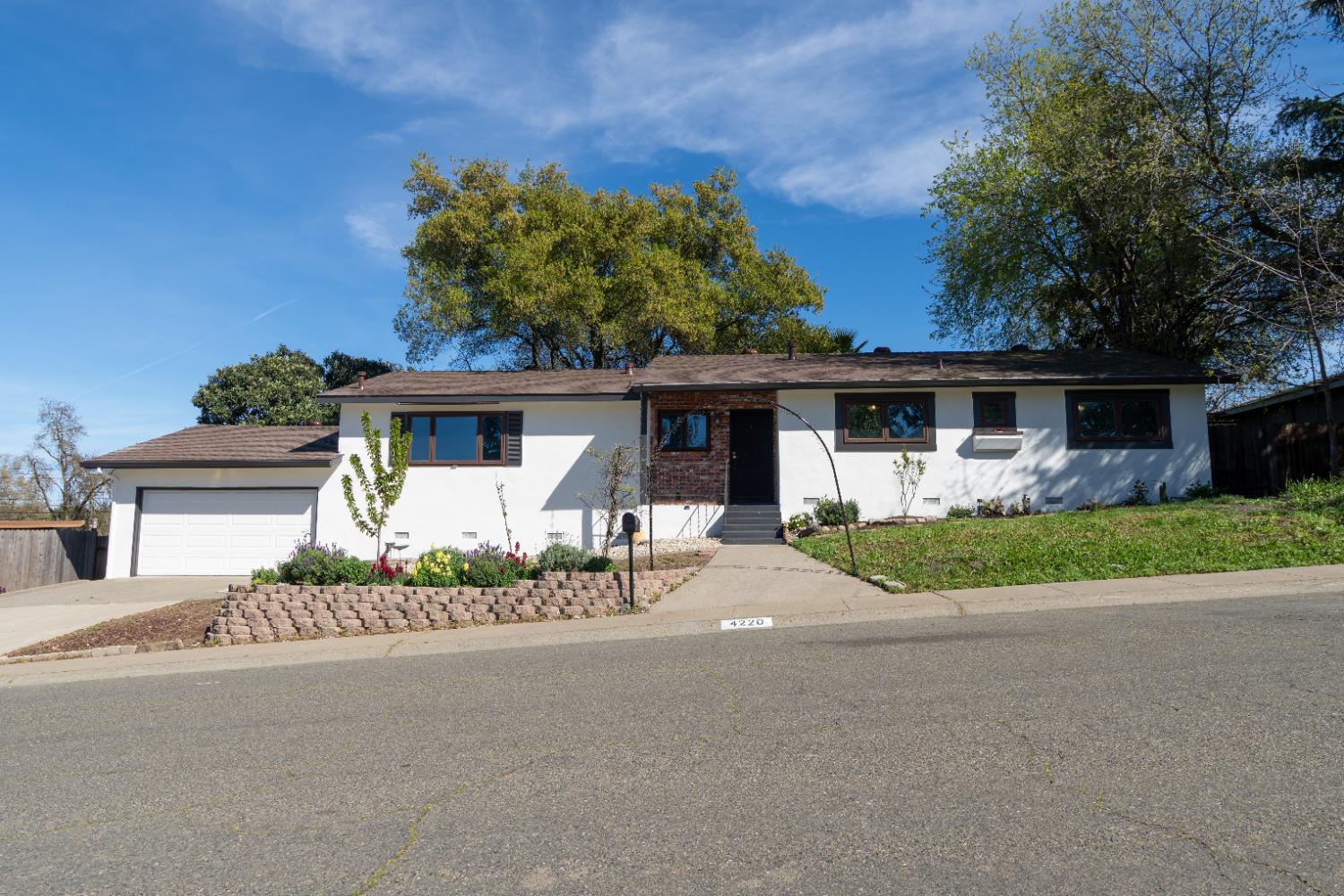 4220 Elva Way Sacramento, CA 95821 - Photo 44 of 52 front view of a house with a small yard