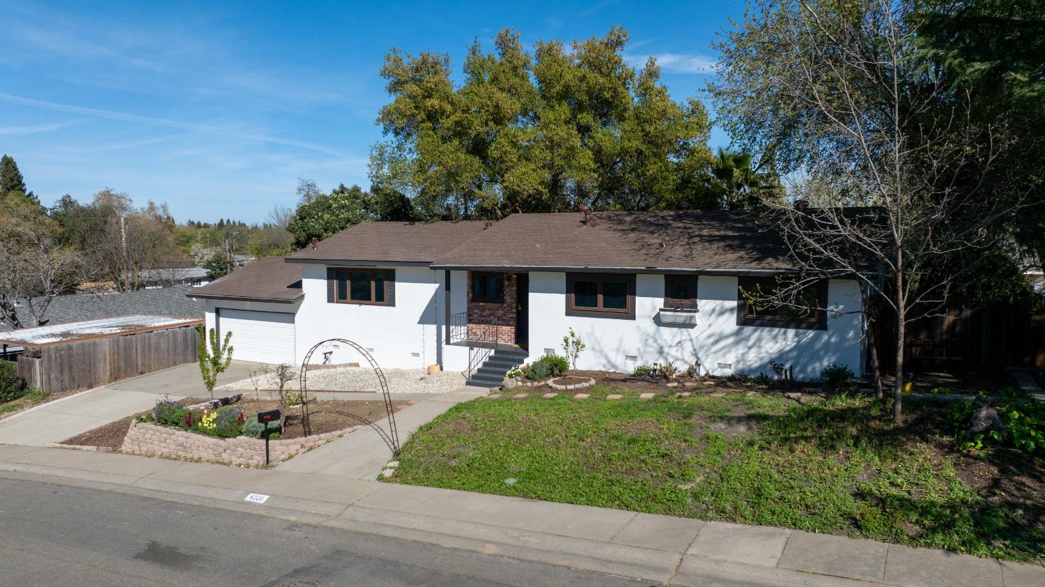 4220 Elva Way Sacramento, CA 95821 - Photo 46 of 52 a front view of a house with garden