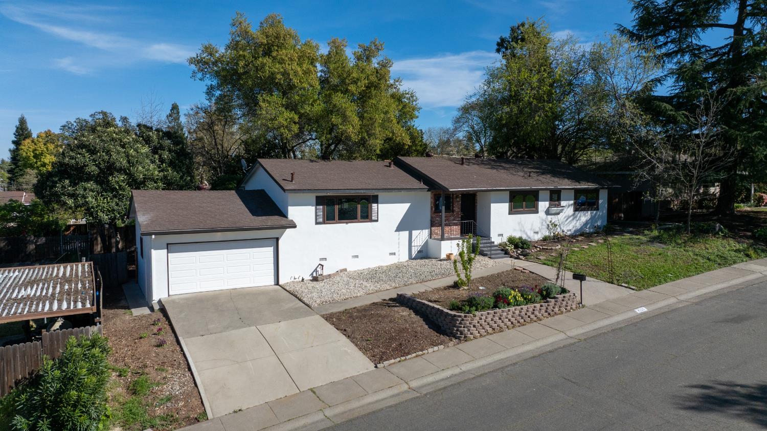 4220 Elva Way Sacramento, CA 95821 - Photo 47 of 52 a front view of a house with garden