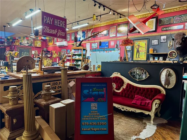 a room with lots of wooden furniture