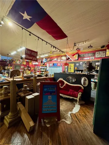 a room with lots of different colored cloths