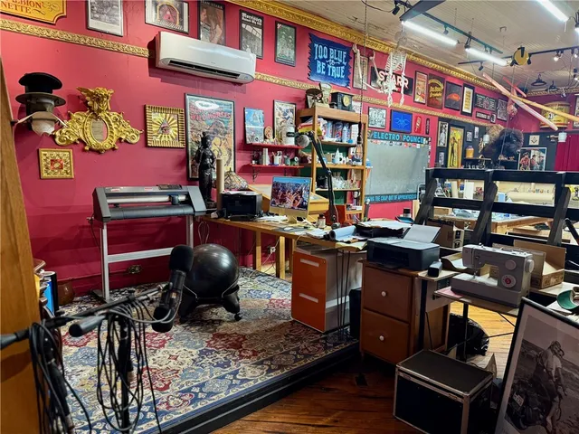 a view of a chairs and table in th patio