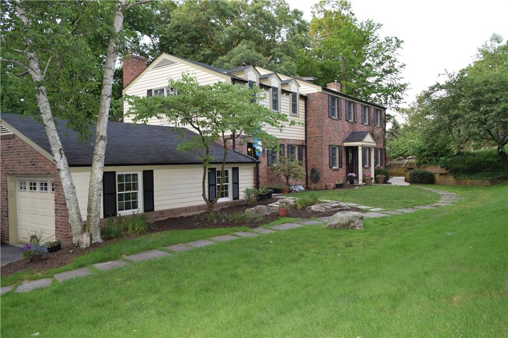 406 Buckingham Road Fox Chapel, PA 15215 - Photo 1 of 25 Welcome to 406 Buckingham Road! This gracious classic Fox Chapel colonial boasts a brick and cedar siding exterior and is situated on a lush 1.5 acre property.