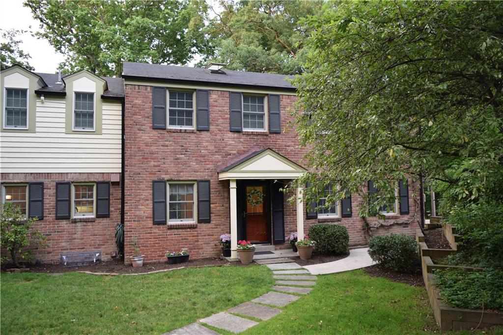 406 Buckingham Road Fox Chapel, PA 15215 - Photo 2 of 25 A gently curving path of hand-cut Pennsylvania bluestone welcomes guests and family to your front door. All of the double-hung windows as well as all doors have been replaced to optimize energy efficiency. Notice the venting skylight with rain sensor; it vents stale hot air and allows fresh air to enter but automatically closes tight at the first raindrops.