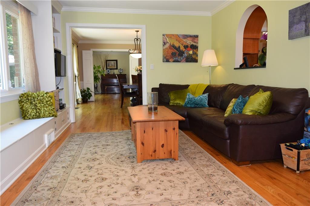 406 Buckingham Road Fox Chapel, PA 15215 - Photo 12 of 25 There's a wonderful flow to the first floor of this family friendly home. Folding French doors give you the option of closing off rooms for greater privacy.