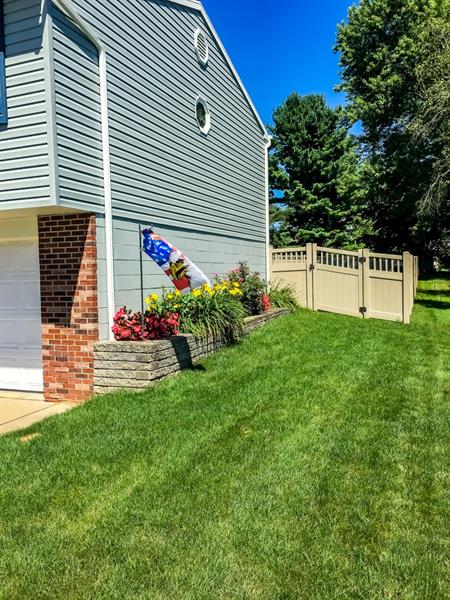 223 East Union Road Cheswick, PA 15024 - Photo 21 of 25 Another shot of the pretty flower beds added to the curb appeal. This was taken last Spring/Summer by owner to help show the potential for all the green thumbs out there.