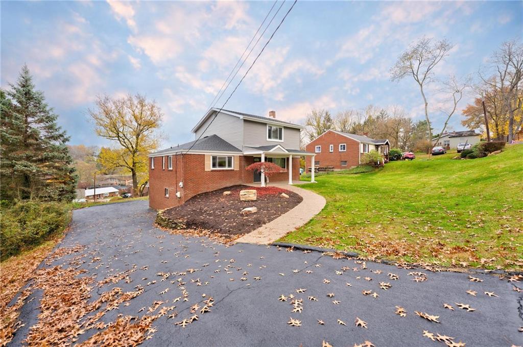 18 Seneca Road Pittsburgh, PA 15241 - Photo 1 of 25 a view of a street with houses