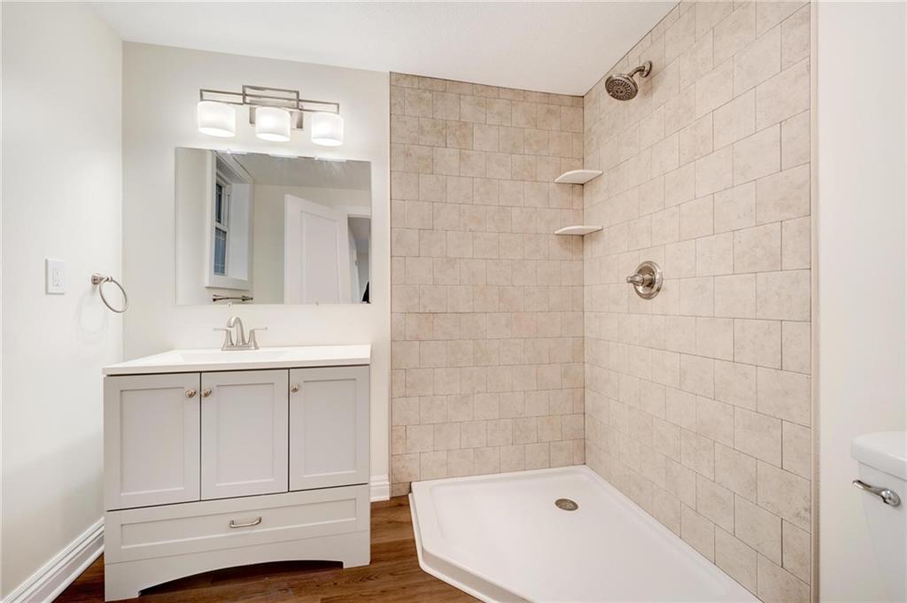 18 Seneca Road Pittsburgh, PA 15241 - Photo 19 of 25 a bathroom with a sink a toilet and shower