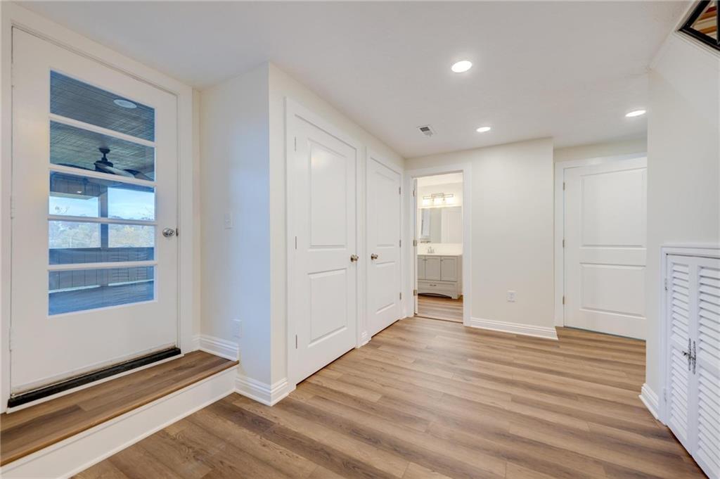 18 Seneca Road Pittsburgh, PA 15241 - Photo 22 of 25 a view of an empty room with wooden floor and windows