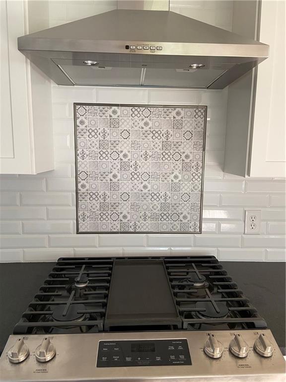 18 Seneca Road Pittsburgh, PA 15241 - Photo 7 of 25 a close view of a stove a microwave and cabinets