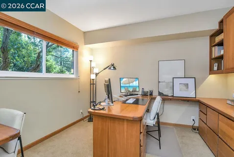 a bed room with a bed and a couch