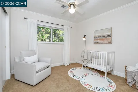 a view of a house with patio and a yard