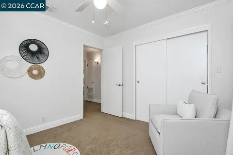 a view of a chair and table on the deck