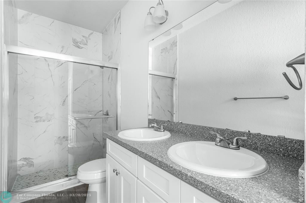 Undisclosed Address Sebring, FL 33870 - Photo 5 of 11 a bathroom with a granite countertop sink toilet and shower