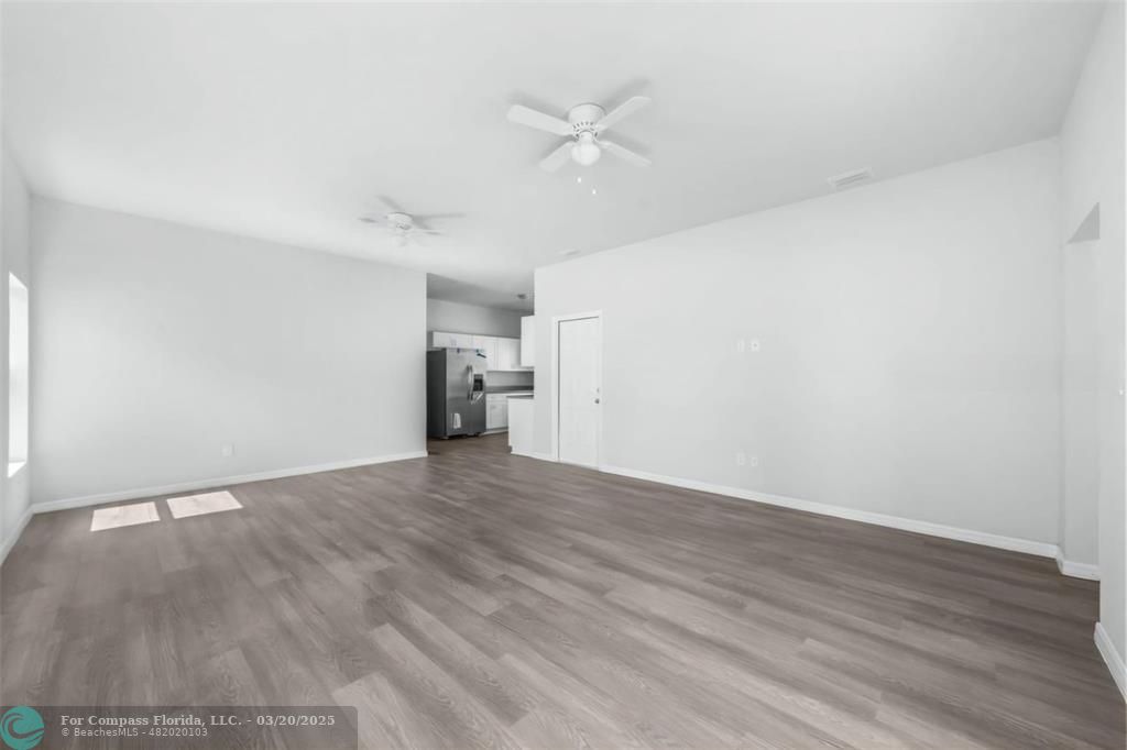 Undisclosed Address Sebring, FL 33870 - Photo 6 of 11 a view of empty room with wooden floor and ceiling fan