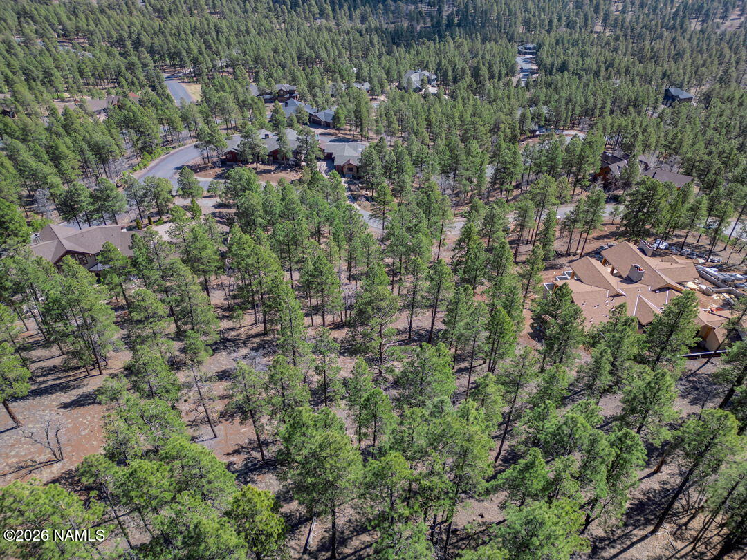 4655 Snaffle Bit Flagstaff, AZ 86005 - Photo 10 of 26 an aerial view of residential house with outdoor space and trees all around