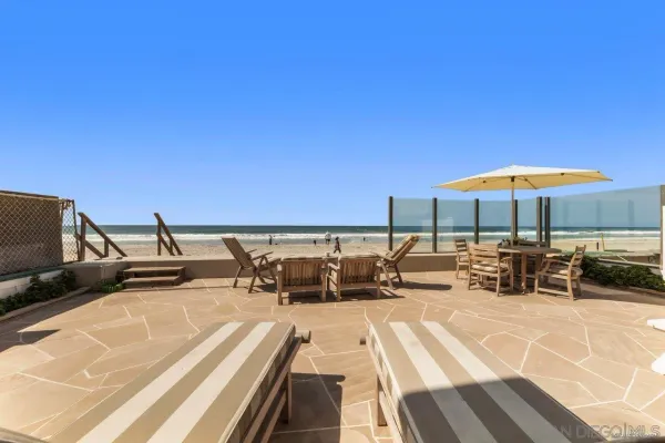 a view of a terrace with chairs