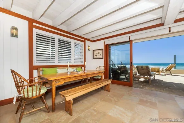 a reading room with furniture and a window