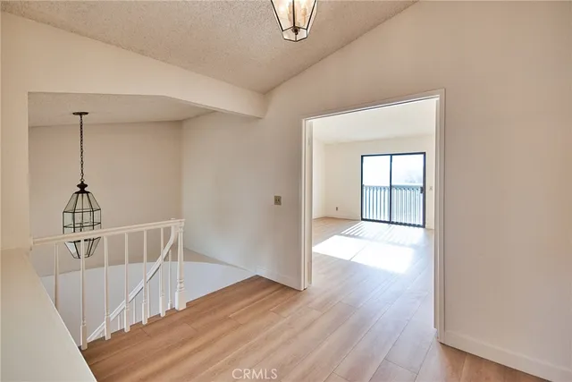 a view of livingroom with furniture and wooden floor