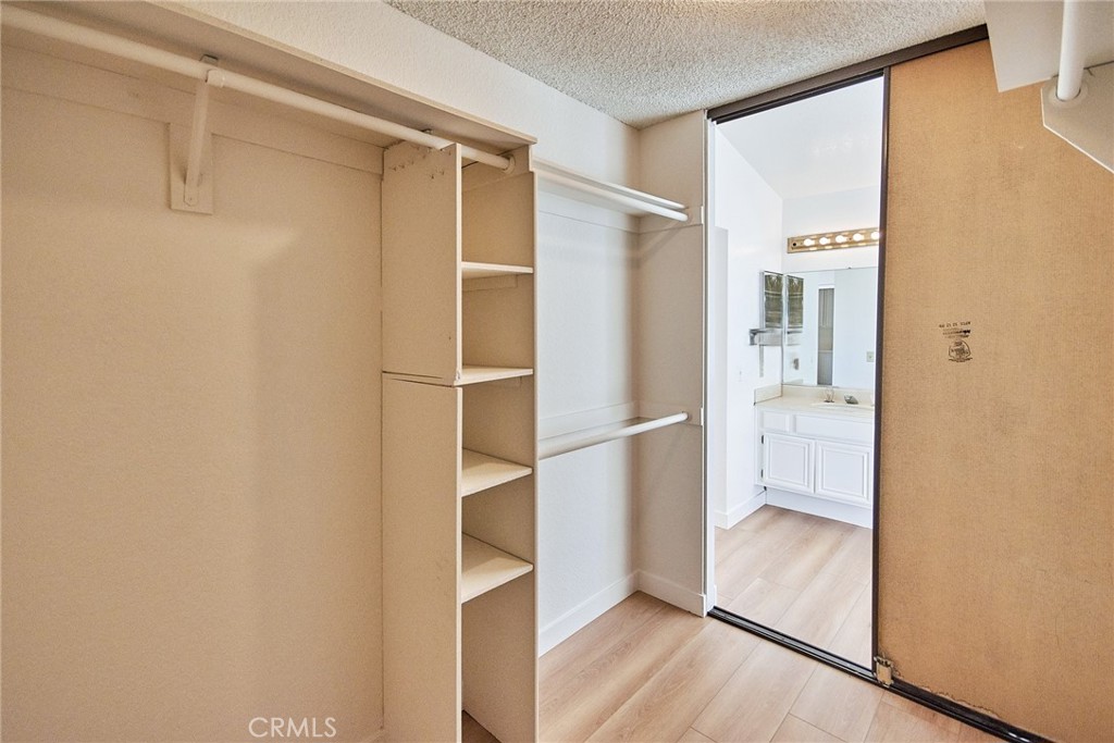 24352 East Rimford Place Diamond Bar, CA 91765 - Photo 22 of 31 a view of closet area with wooden floor