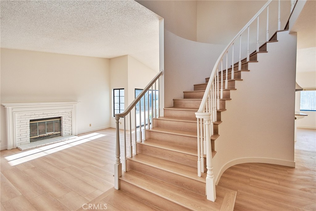 24352 East Rimford Place Diamond Bar, CA 91765 - Photo 3 of 31 a view of entryway and hall with wooden floor