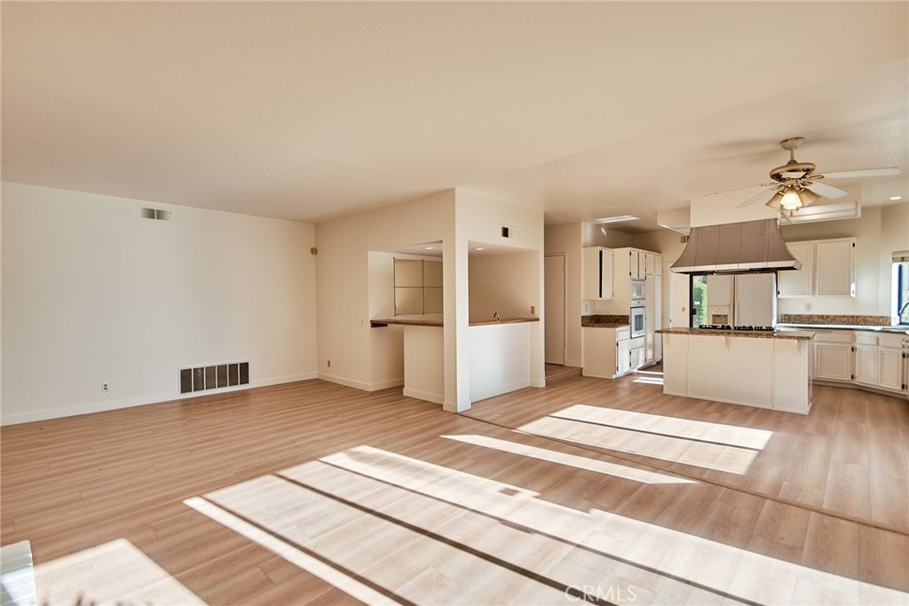 24352 East Rimford Place Diamond Bar, CA 91765 - Photo 9 of 31 a view of a kitchen with furniture and refrigerator