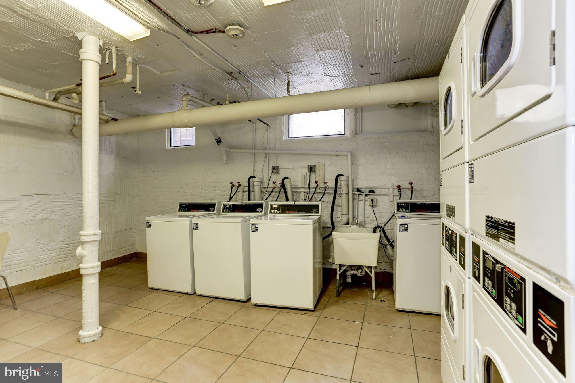 1457 Park Road Northwest, Unit 403 Washington, DC 20010 - Photo 22 of 22 Common Area Laundry Room