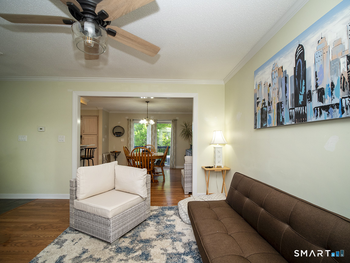 82 Wilcox Road Middletown, CT 06457 - Photo 10 of 27 a living room with furniture and wooden floor