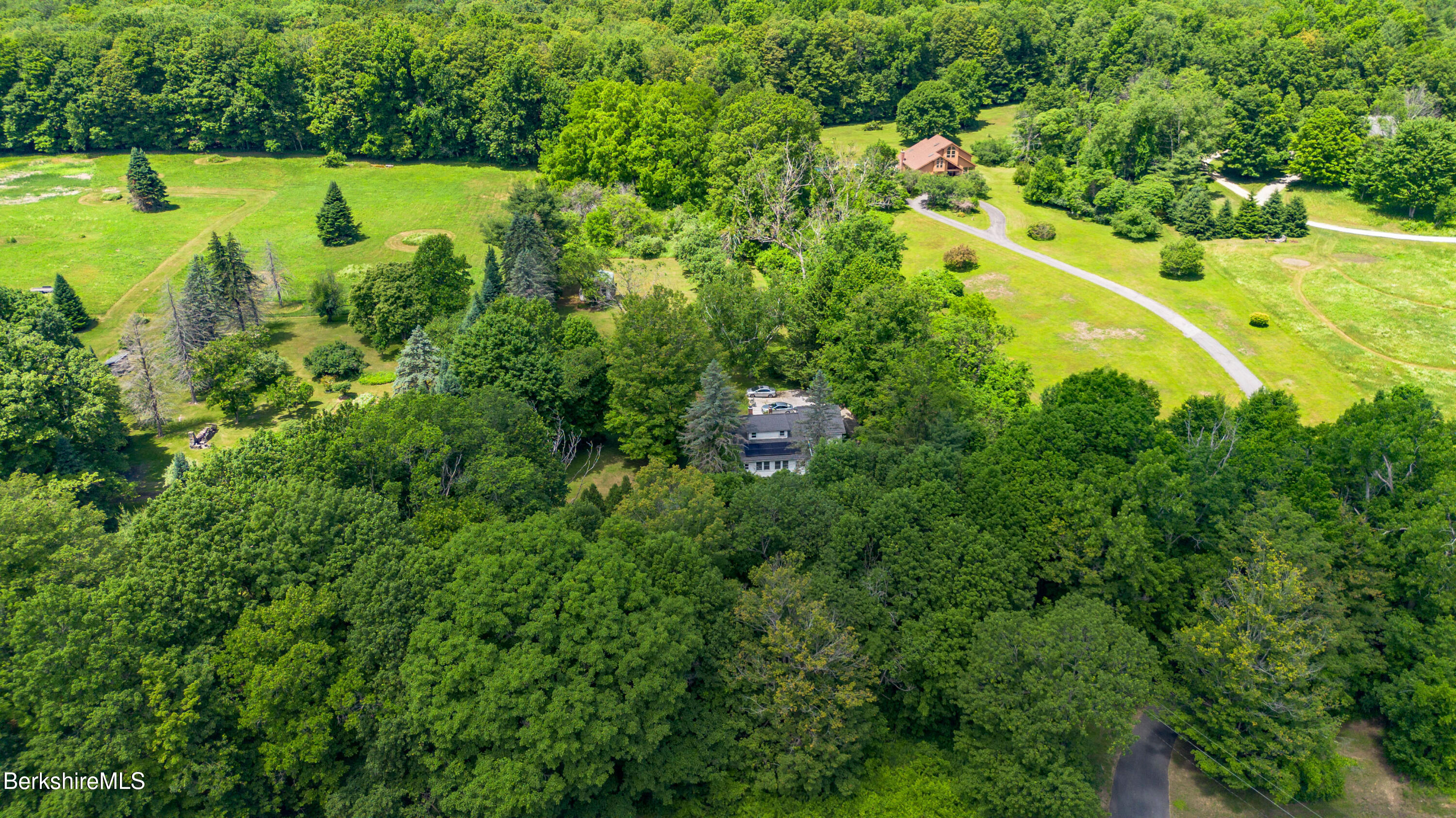 477 North State Road Cheshire, MA 01225 - Photo 5 of 25 a view of a large garden with a small yard