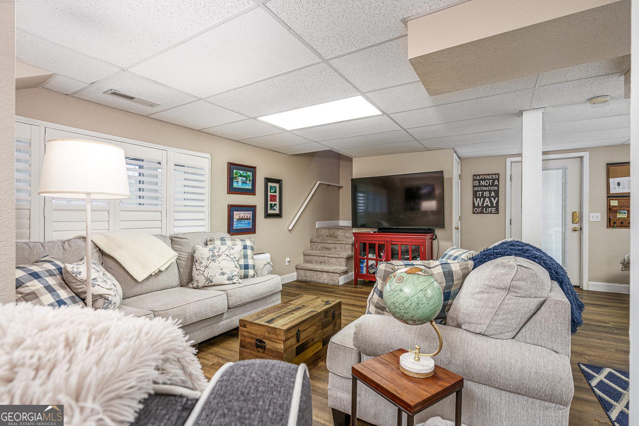 15 Lonesome Pine Road Murphy, NC 28906 - Photo 25 of 61 a living room with furniture a flat screen tv and a large window