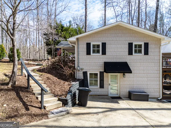 a outdoor living space with furniture and a potted plant
